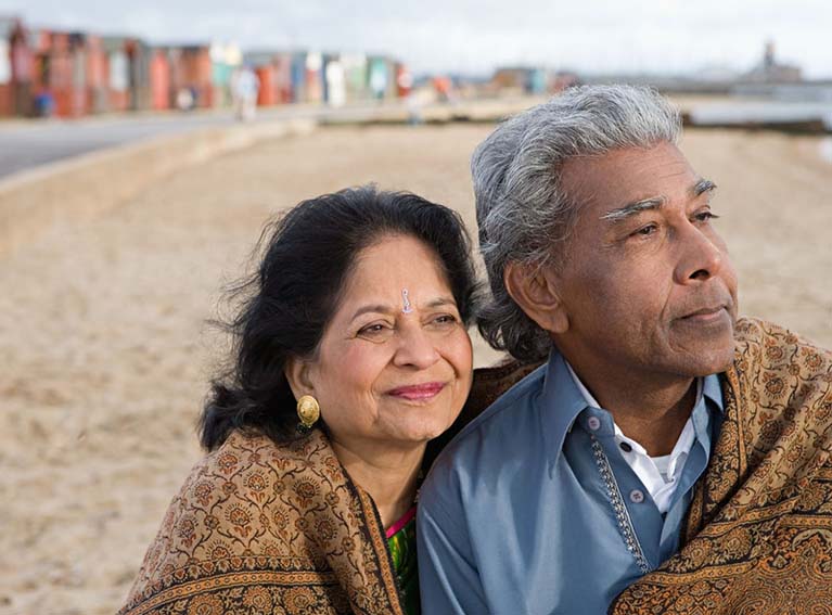 Old couple on the beach
