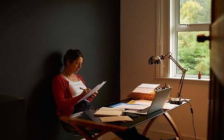 Woman sat in study