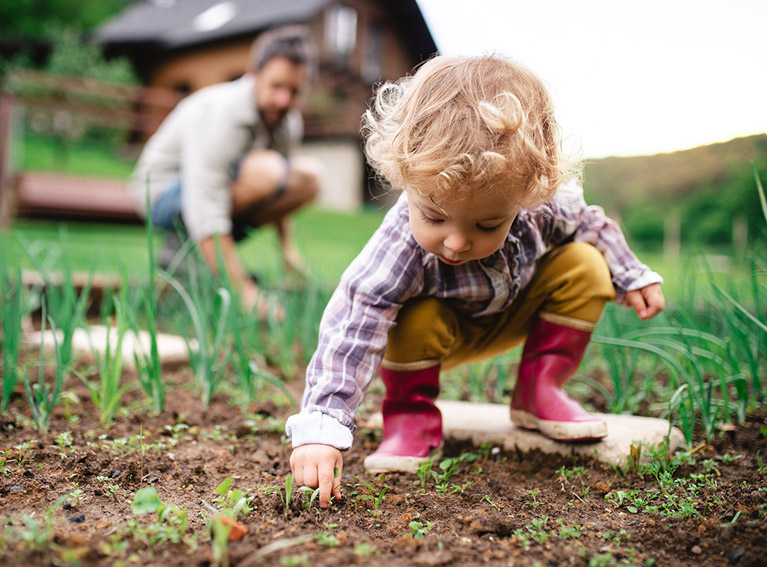 Father and child gardening